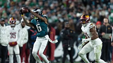 Nov 14, 2024; Philadelphia, Pennsylvania, USA; Philadelphia Eagles wide receiver DeVonta Smith (6) makes a catch in front of Washington Commanders safety Jeremy Chinn (11) during the second quarter at Lincoln Financial Field. Mandatory Credit: Bill Streicher-Imagn Images