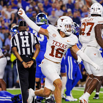 Oct 18, 2025; Lexington, Kentucky, USA; Texas Longhorns defensive back Michael Taaffe (16) celebrates after the Kentucky Wildcats fail to score during overtime at Kroger Field. Mandatory Credit: Jordan Prather-Imagn Images