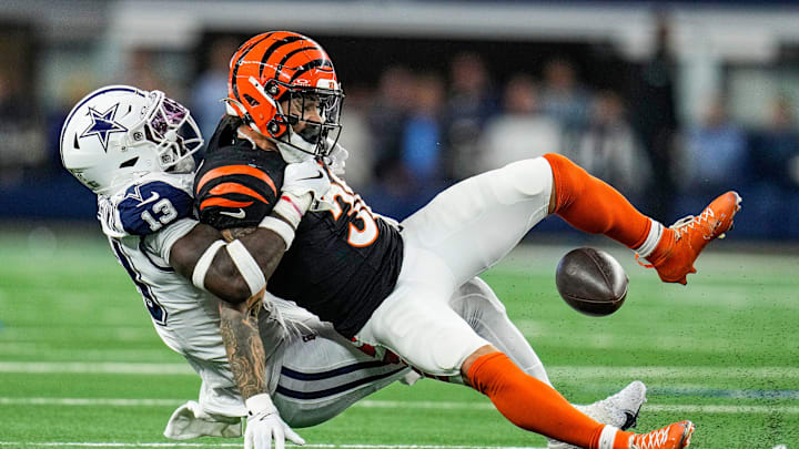 Dallas Cowboys linebacker DeMarvion Overshown takes down Cincinnati Bengals running back Chase Brown (30) Monday Night Football at AT&T Stadium in Arlington,Texas on Monday, December 9, 2024.