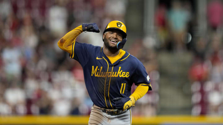 Milwaukee Brewers outfielder Jackson Chourio (11) smiles as he runs the bases after hitting a home run against the Cincinnati Reds in the ninth inning at Great American Ball Park on Aug. 31.