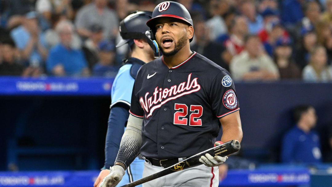 Aug 28, 2023; Toronto, Ontario, CAN;  Washington Nationals first baseman Dominic Smith (22) reacts after striking out swinging against the Toronto Blue Jays in the fifth inning at Rogers Centre.