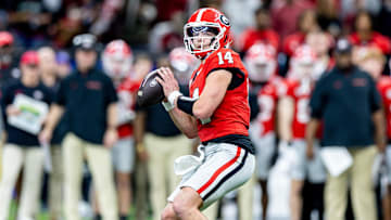 Jan 2, 2025; New Orleans, LA, USA;  Georgia Bulldogs quarterback Gunner Stockton (14) drops back to pass against against the Notre Dame Fighting Irish during the second half at Caesars Superdome. Mandatory Credit: Stephen Lew-Imagn Images