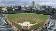 Jul 24, 2024; Chicago, Illinois, USA; The Chicago Cubs take batting practice before a game against the Milwaukee Brewers at Wrigley Field. 