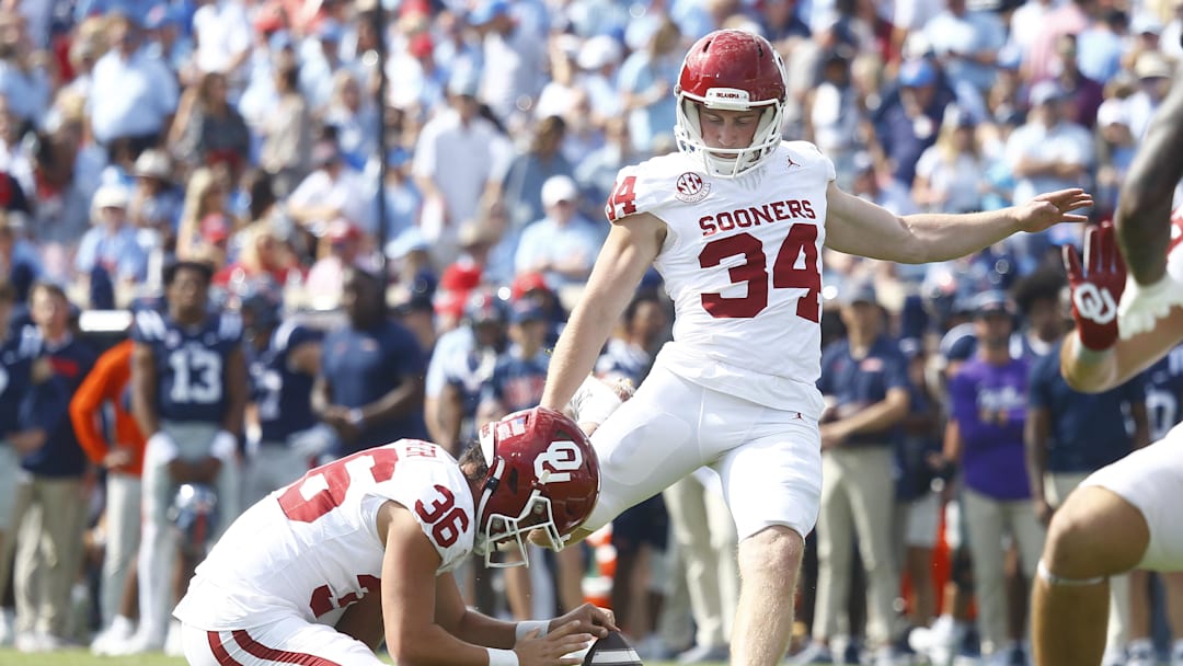 Oct 26, 2024; Oxford, Mississippi, USA; Oklahoma Sooners kicker/kicker Zach Schmit (34) kicks a filed goal during the first half against the Mississippi Rebels at Vaught-Hemingway Stadium. Mandatory Credit: Petre Thomas-Imagn Images