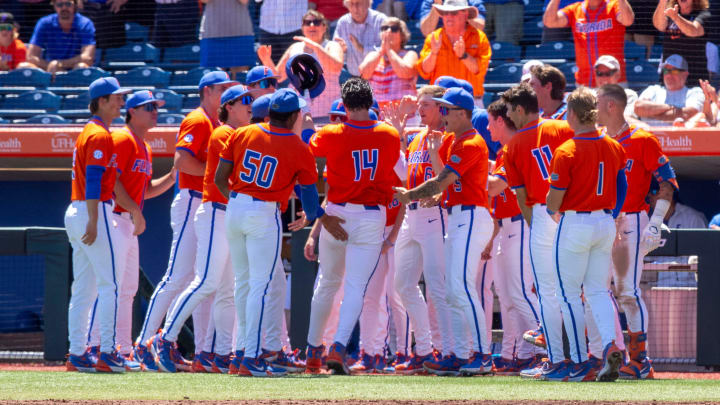 Gators utility Jac Caglianone (14) with his 20th homer of the season in the bottom of the second inning against South Carolina. The Gators ended their six game losing streak with an 11-9 win over the Gamecocks in Game 3 of the weekend series at Condron Family Ballpark in Gainesville, Florida, Sunday, April 14, 2024. [Cyndi Chambers/ Gainesville Sun] 2024