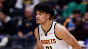 Dec 27, 2024; Denver, Colorado, USA; Denver Nuggets forward Spencer Jones (21) in the fourth quarter against the Cleveland Cavaliers at Ball Arena.
