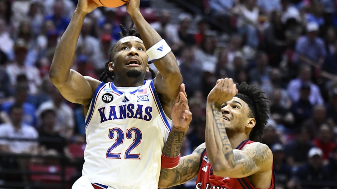 Mar 22, 2026; San Diego, CA, USA; Kansas Jayhawks guard Darryn Peterson (22) shoots against St. John's Red Storm forward Dillon Mitchell (1) in the first half during a second round game of the men's 2026 NCAA Tournament at Viejas Arena. Mandatory Credit: Denis Poroy-Imagn Images Mar 22, 2026; San Diego, CA, USA; Kansas Jayhawks guard Darryn Peterson (22) shoots against St. John's Red Storm forward Dillon Mitchell (1) in the first half during a second round game of the men's 2026 NCAA Tournament at Viejas Arena. Mandatory Credit: Denis Poroy-Imagn Images