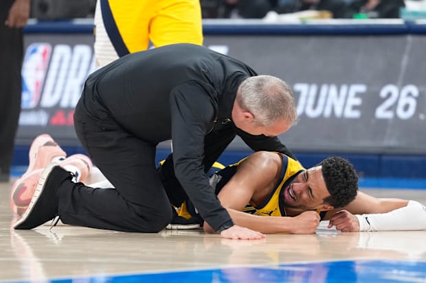 Indiana Pacers guard Tyrese Haliburton (0) reacts after suffering an injury