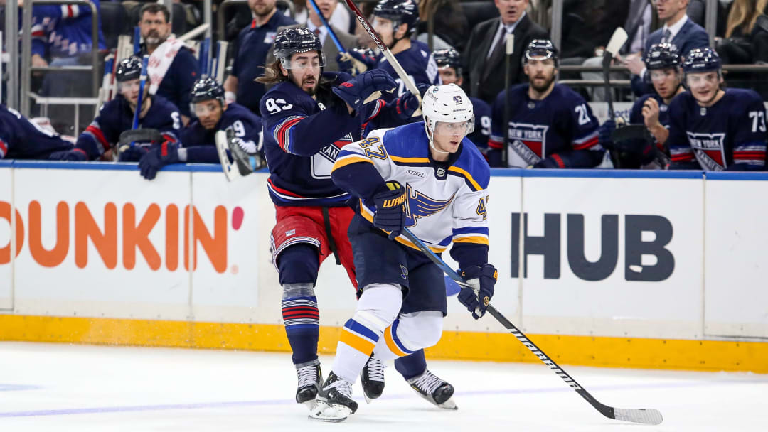 Mar 9, 2024; New York, New York, USA; New York Rangers center Mika Zibanejad (93) and St. Louis Blues defenseman Torey Krug (47) get tangled up during the second period at Madison Square Garden. Mandatory Credit: Danny Wild-USA TODAY Sports