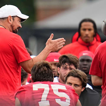 Ohio State Buckeyes head coach Ryan Day addresses his team during the first football practice of the season at the Woody Hayes Athletic Center on July 31, 2025.