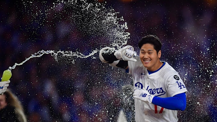 Ohtani and the Dodgers celebrate after a walk-off. Ohtani and the Dodgers celebrate after a walk-off.