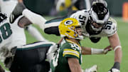 Philadelphia Eagles linebacker Jaelan Phillips (50) pressures Green Bay Packers quarterback Jordan Love (10) during the fourth quarter of their game Monday, November 10, 2025 at Lambeau Field in Green Bay, Wisconsin.