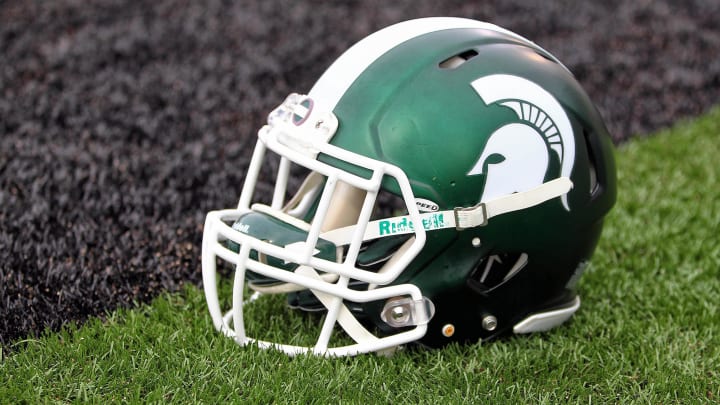 Sep 4, 2015; Kalamazoo, MI, USA; General view of Michigan State Spartans helmet on field prior to a game against Western Michigan at Waldo Stadium. Mandatory Credit: Mike Carter-USA TODAY Sports