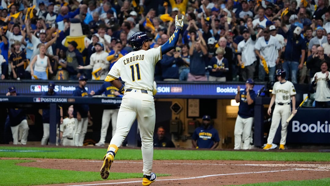 Oct 6, 2025; Milwaukee, Wisconsin, USA; Milwaukee Brewers center fielder Jackson Chourio (11) celebrates after hitting a three run home run during the fourth inning against the Chicago Cubs during game two of the NLDS round for the 2025 MLB playoffs at American Family Field. Mandatory Credit: Michael McLoone-Imagn Images
