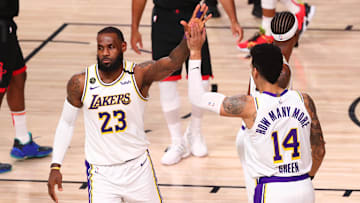 Sep 12, 2020; Lake Buena Vista, Florida, USA; Los Angeles Lakers forward LeBron James (23) celebrates with guard Danny Green (14) in the second half of game five of the second round against the Houston Rockets in the 2020 NBA Playoffs at ESPN Wide World of Sports Complex. Mandatory Credit: Kim Klement-Imagn Images