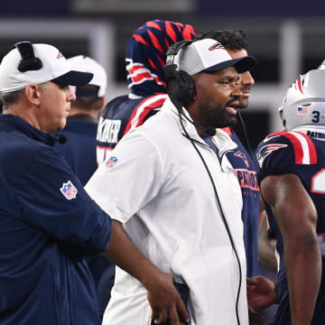 August 8, 2024; Foxborough, MA, USA;  New England Patriots head coach Jerod Mayo works from the sideline during the first half against the Carolina Panthers at Gillette Stadium. Mandatory Credit: Eric Canha-USA TODAY Sports