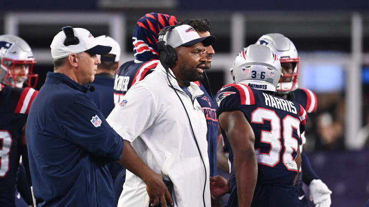 August 8, 2024; Foxborough, MA, USA;  New England Patriots head coach Jerod Mayo works from the sideline during the first half against the Carolina Panthers at Gillette Stadium. Mandatory Credit: Eric Canha-USA TODAY Sports