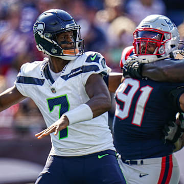 Sep 15, 2024; Foxborough, Massachusetts, USA; Seattle Seahawks quarterback Geno Smith (7) throws a pass against the New England Patriots in the second half at Gillette Stadium.