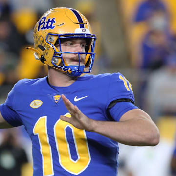 Nov 9, 2024; Pittsburgh, Pennsylvania, USA;  Pittsburgh Panthers quarterback Eli Holstein (10) passes against the Virginia Cavaliers during the first quarter at Acrisure Stadium. Mandatory Credit: Charles LeClaire-Imagn Images