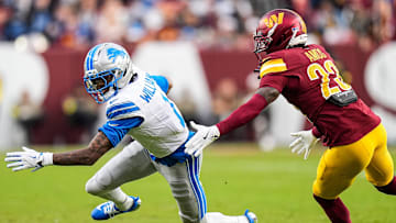 Detroit Lions wide receiver Jameson Williams (1) makes a catch against Washington Commanders cornerback Trey Amos (23) during the first half at Northwest Stadium in Landover, Md. on Sunday, November 9, 2025.