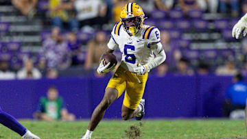 Nov 22, 2025; Baton Rouge, Louisiana, USA;  LSU Tigers wide receiver Barion Brown (6) runs against the Western Kentucky Hilltoppers during the second half at Tiger Stadium. Mandatory Credit: Stephen Lew-Imagn Images