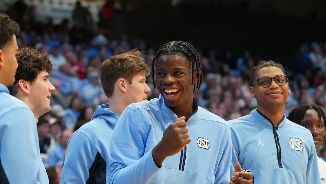 Feb 14, 2026; Chapel Hill, North Carolina, USA; North Carolina Tar Heels forward Caleb Wilson (8) reacts on the bench in the second half at Dean E. Smith Center. Mandatory Credit: Bob Donnan-Imagn Images