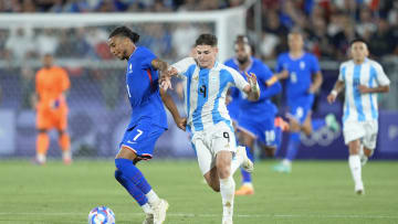 France v Argentina: Men's Football Quarterfinal - Olympic Games Paris 2024: Day 7 - Olise battling with Julian Alvarez 