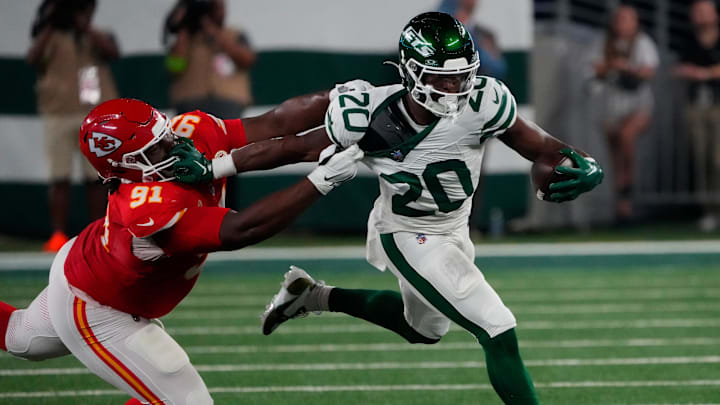 Oct 1, 2023; East Rutherford, New Jersey, USA; Kansas City Chiefs defensive tackle Derrick Nnadi (91) is called for a horsecollar penalty against New York Jets running back Breece Hall (20) at MetLife Stadium. Mandatory Credit: Robert Deutsch-Imagn Images