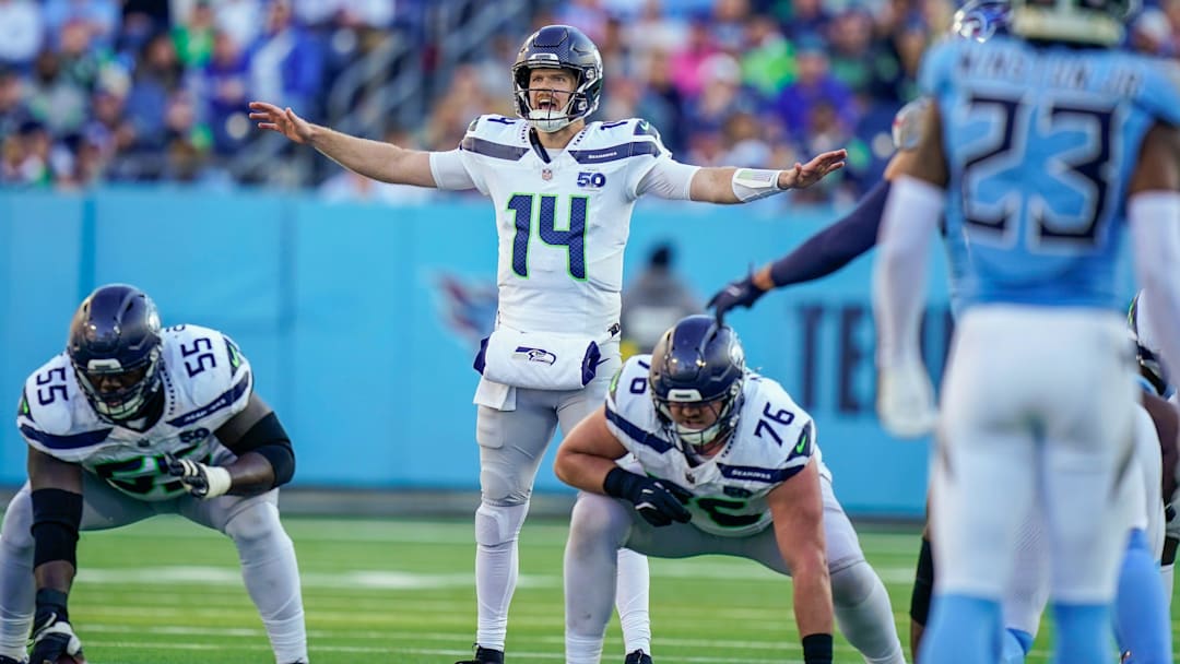 Seattle Seahawks quarterback Sam Darnold (14) calls to teammates on a third down play during the third quarter against the Seattle Seahawks at Nissan Stadium in Nashville, Tenn., Sunday, Nov. 23, 2025.