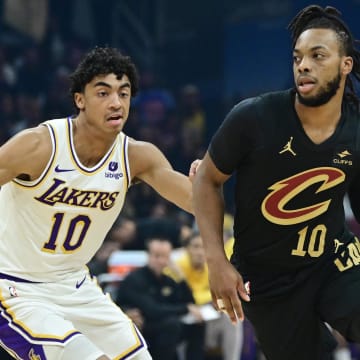 Nov 25, 2023; Cleveland, Ohio, USA; Cleveland Cavaliers guard Darius Garland (10) drives to the basket against Los Angeles Lakers guard Max Christie (10) during the first half at Rocket Mortgage FieldHouse. Mandatory Credit: Ken Blaze-USA TODAY Sports