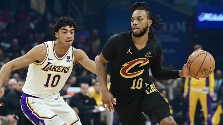 Nov 25, 2023; Cleveland, Ohio, USA; Cleveland Cavaliers guard Darius Garland (10) drives to the basket against Los Angeles Lakers guard Max Christie (10) during the first half at Rocket Mortgage FieldHouse. Mandatory Credit: Ken Blaze-USA TODAY Sports