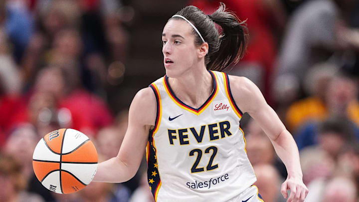 Indiana Fever guard Caitlin Clark (22) rushes up the court Friday, July 12, 2024, during the game at Gainbridge Fieldhouse in Indianapolis. The Indiana Fever defeated the Phoenix Mercury, 95-86.