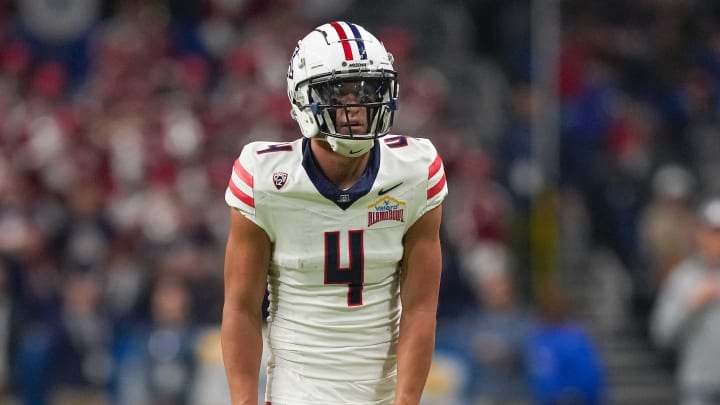 Dec 28, 2023; San Antonio, TX, USA;  Arizona Wildcats wide receiver Tetairoa McMillan (4) gets ready for a play in the first half against the Oklahoma Sooners at Alamodome