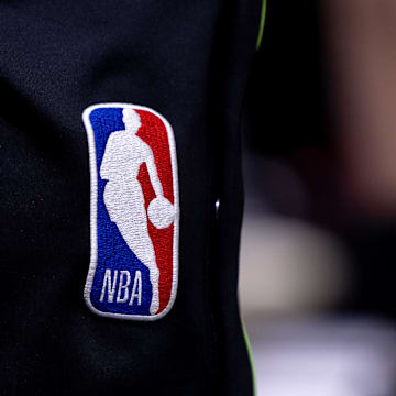 Apr 29, 2024; New Orleans, Louisiana, USA; Detailed view go the NBA logo between the New Orleans Pelicans and the Oklahoma City Thunder r during the second half of game four of the first round for the 2024 NBA playoffs at Smoothie King Center. Mandatory Credit: Stephen Lew-Imagn Images