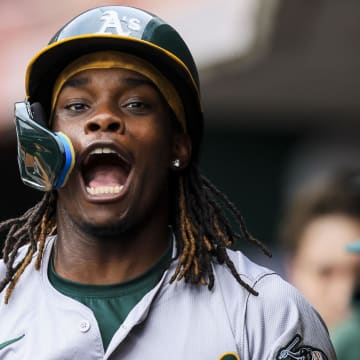 Aug 28, 2024; Cincinnati, Ohio, USA; Oakland Athletics outfielder Lawrence Butler (4) reacts after hitting a solo home run in the first inning against the Cincinnati Reds at Great American Ball Park. Mandatory Credit: Katie Stratman-USA TODAY Sports