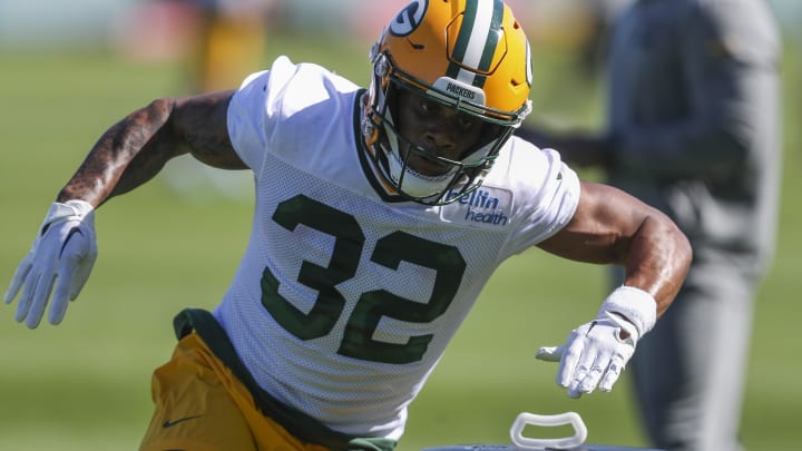 Green Bay Packers running back MarShawn Lloyd (32) runs through drills during rookie minicamp on Friday, May 3, 2024, at the Don Hutson Center in Green Bay, Wis. 
Tork Mason/USA TODAY NETWORK-Wisconsin