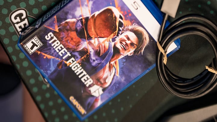 A copy of Street Fighter 6, a popular and competitive fighting video game, sits on a desk inside Herkimer County Community College's new eSports Center in Herkimer, NY on Thursday, November 16, 2023.