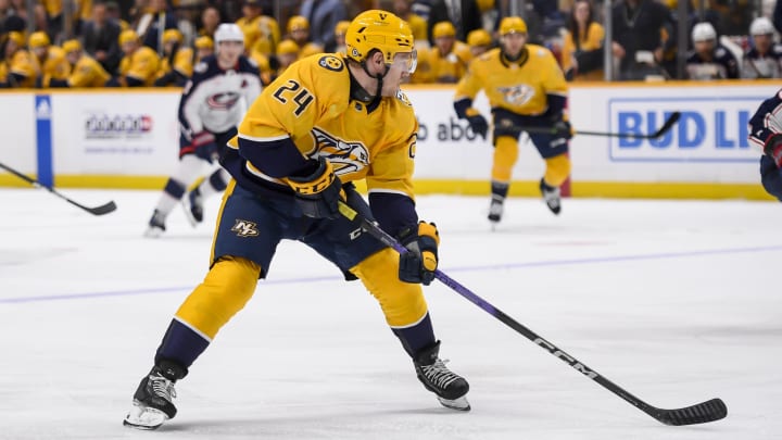 Apr 13, 2024; Nashville, Tennessee, USA; Nashville Predators defenseman Spencer Stastney (24) skates against the Columbus Blue Jackets during the first period at Bridgestone Arena. Mandatory Credit: Steve Roberts-USA TODAY Sports