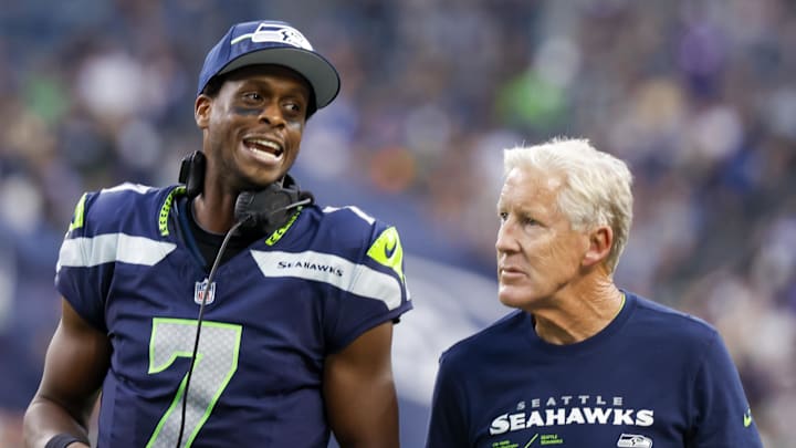 Seattle Seahawks quarterback Geno Smith talks with head coach Pete Carroll against the Dallas Cowboys. Seattle Seahawks quarterback Geno Smith talks with head coach Pete Carroll against the Dallas Cowboys.