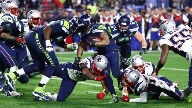 Seattle Seahawks running back Marshawn Lynch (24) against the New England Patriots in Super Bowl XLIX.