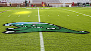 Sep 4, 2021; Norman, Oklahoma, USA;  The logo of the Tulane Green Wave is displayed on the field before the game against the Oklahoma Sooners at Gaylord Family-Oklahoma Memorial Stadium. 