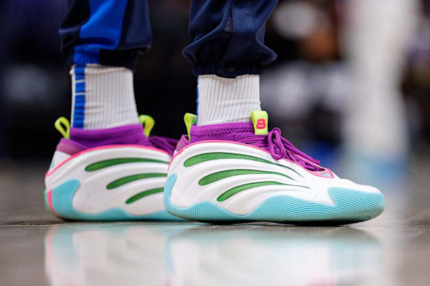 Jalen William's white and purple adidas shoes.