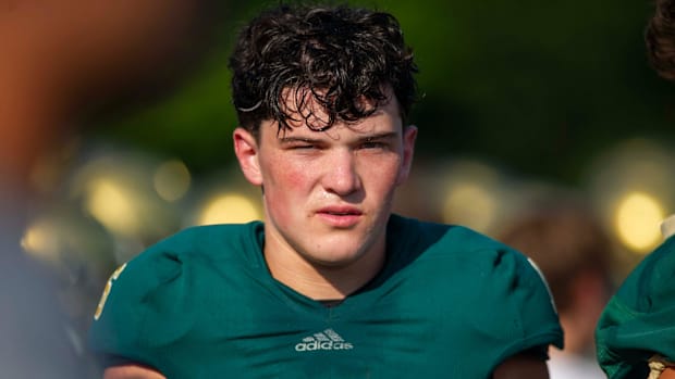 Catholic's Casen Jenkins (16) on the sidelines during a scrimmage between West and Catholic High School at Blaine Stadium 