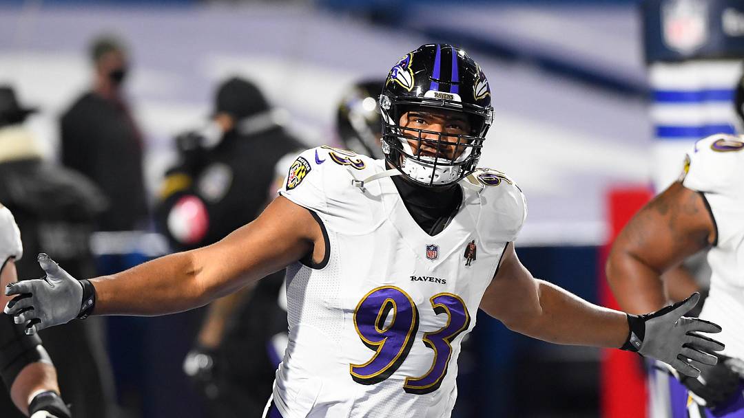 Jan 16, 2021; Orchard Park, New York, USA; Baltimore Ravens defensive end Calais Campbell (93) gestures while jogging on the field prior to an AFC Divisional Round game against the Buffalo Bills at Bills Stadium. Mandatory Credit: Rich Barnes-Imagn Images