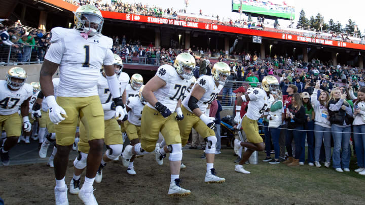 Nov 25, 2023; Stanford, California, USA; Notre Dame Fighting Irish players take the field against