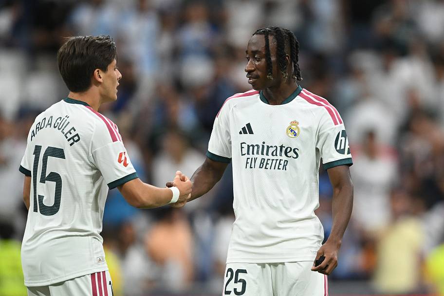Arda Güler (left) and Yan Diomande shaking hands.