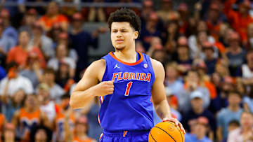 Florida guard Walter Clayton Jr. takes the ball up the court during a game against the Auburn Tigers