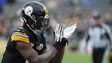Dec 25, 2024; Pittsburgh, Pennsylvania, USA;  Pittsburgh Steelers wide receiver George Pickens (14) reacts after a Kansas City Chiefs penalty during the fourth quarter at Acrisure Stadium. Mandatory Credit: Charles LeClaire-Imagn Images