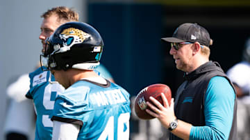 Jacksonville Jaguars head coach Liam Coen talks with teammates Jacksonville Jaguars punter Logan Cooke (9) and Jacksonville Jaguars long snapper Ross Matiscik (46) during the Jacksonville Jaguars’ third mandatory minicamp Thursday June 12, 2025 at the Miller Electric Center in Jacksonville, Fla. [Doug Engle/Florida Times-Union]
