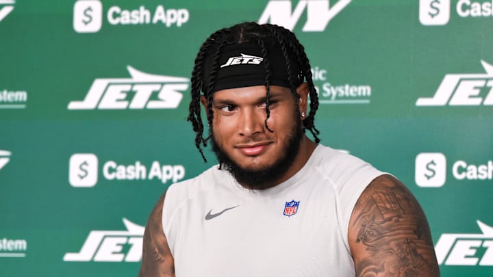 Jun 10, 2025; East Rutherford, NJ, USA; New York Jets linebacker Jermaine Johnson (11) speaks at a press conference during minicamp at Atlantic Health Jets Training Center. Mandatory Credit: John Jones-Imagn Images
